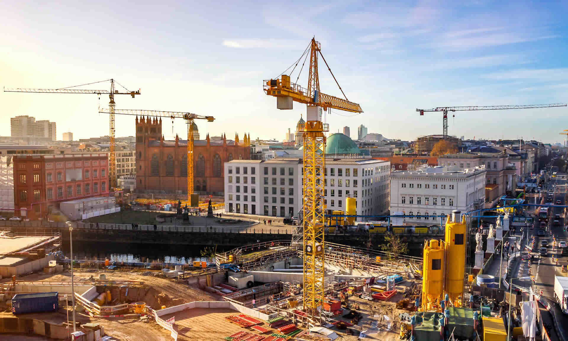 Skyscrapers and cranes under construction daytime
